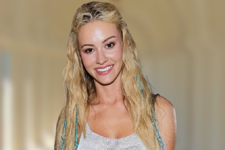 Bryana Holly smiling and posing for the camera.