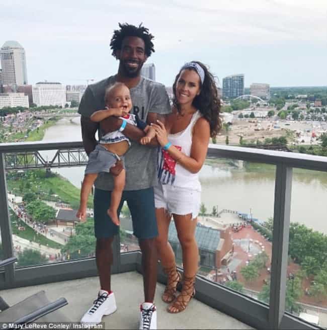 Conley and his wife with thier son